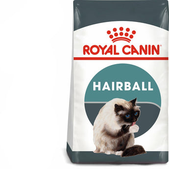 A package of Royal Canin Hairball Care dry cat food, featuring an image of a Siamese cat and indicating that the product helps in reducing hairball formation and is proven to results in 14 days.