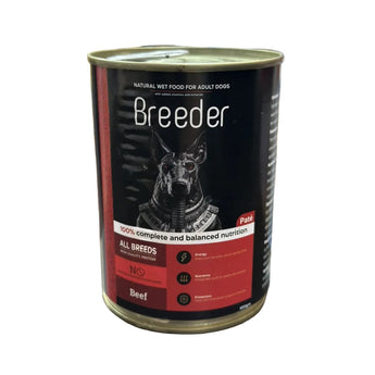 Can of Breeder dog food on a table with a blurred background