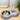 Pet feeding station with water bottle and bowls on a beige surface
