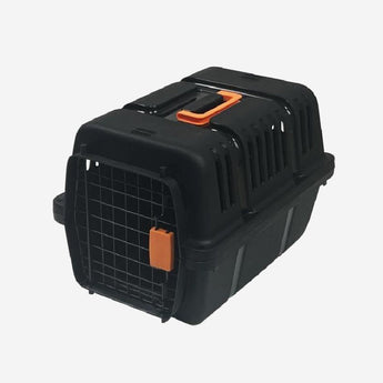 Black pet carrier with orange accents on a white background