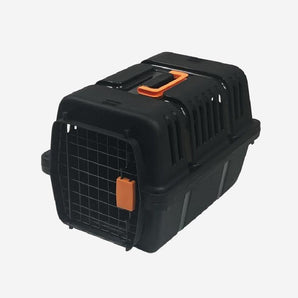 Black pet carrier with orange accents on a white background